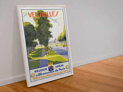 Versailles Sejour Ideal poster in a white frame leaning against a wall
