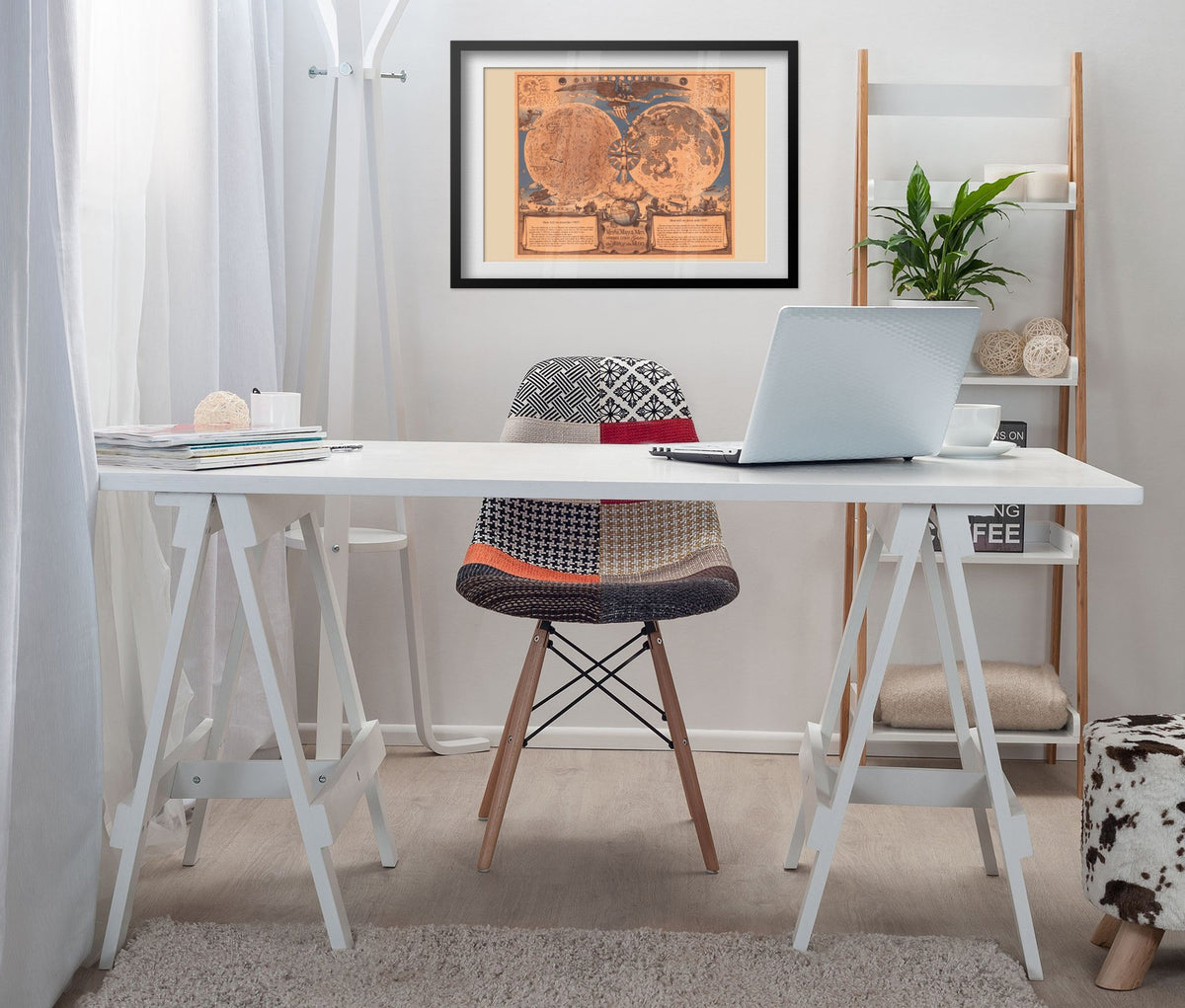 Vintage illustrated Moon map poster framed above a white desk