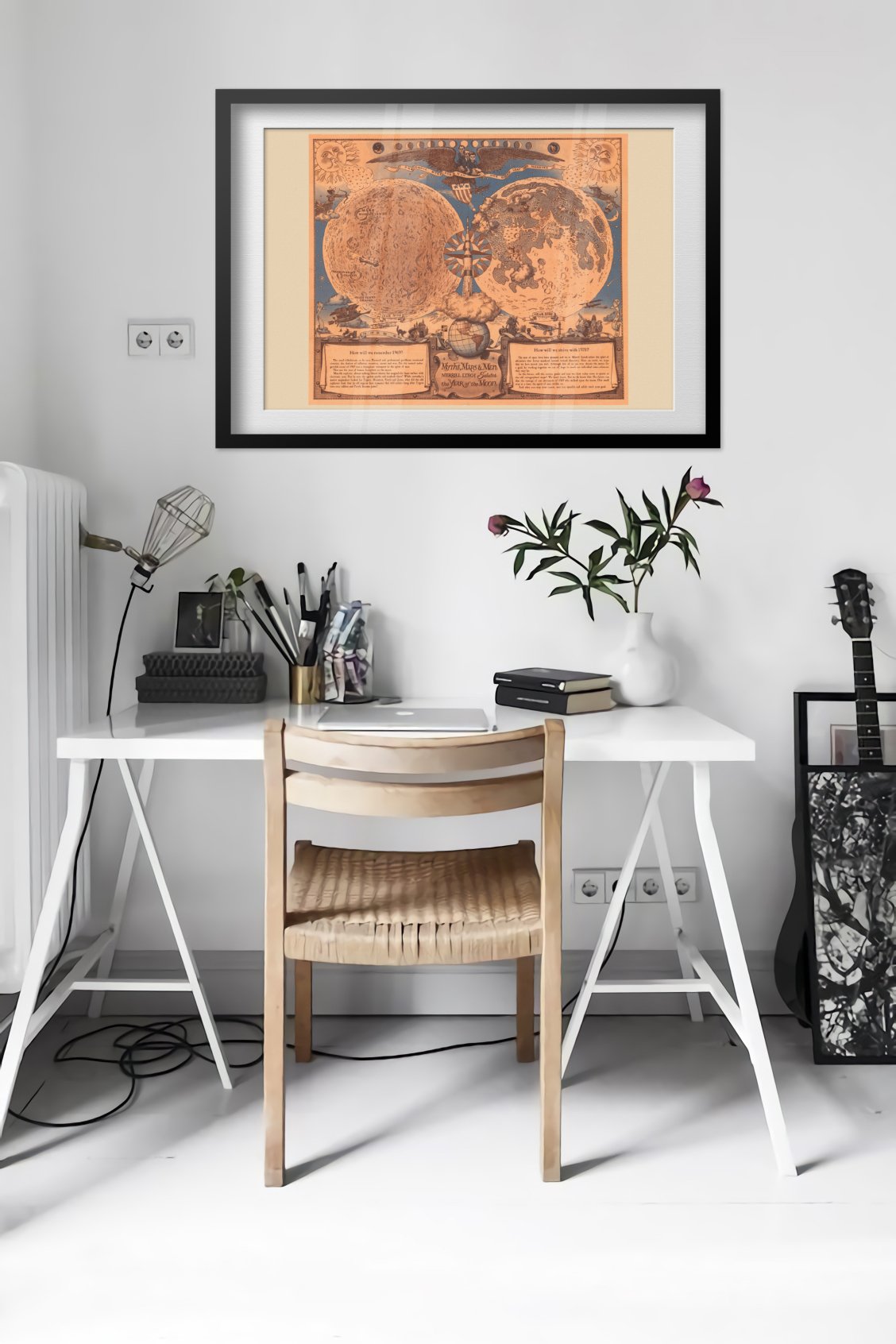 Vintage illustrated Moon map poster framed in a bright home office