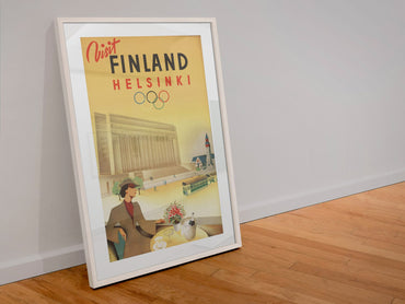 Visit Finland Helsinki poster in a white frame leaning against a wall