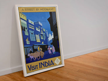 Visit India Street by Moonlight poster in a white frame leaning against a wall