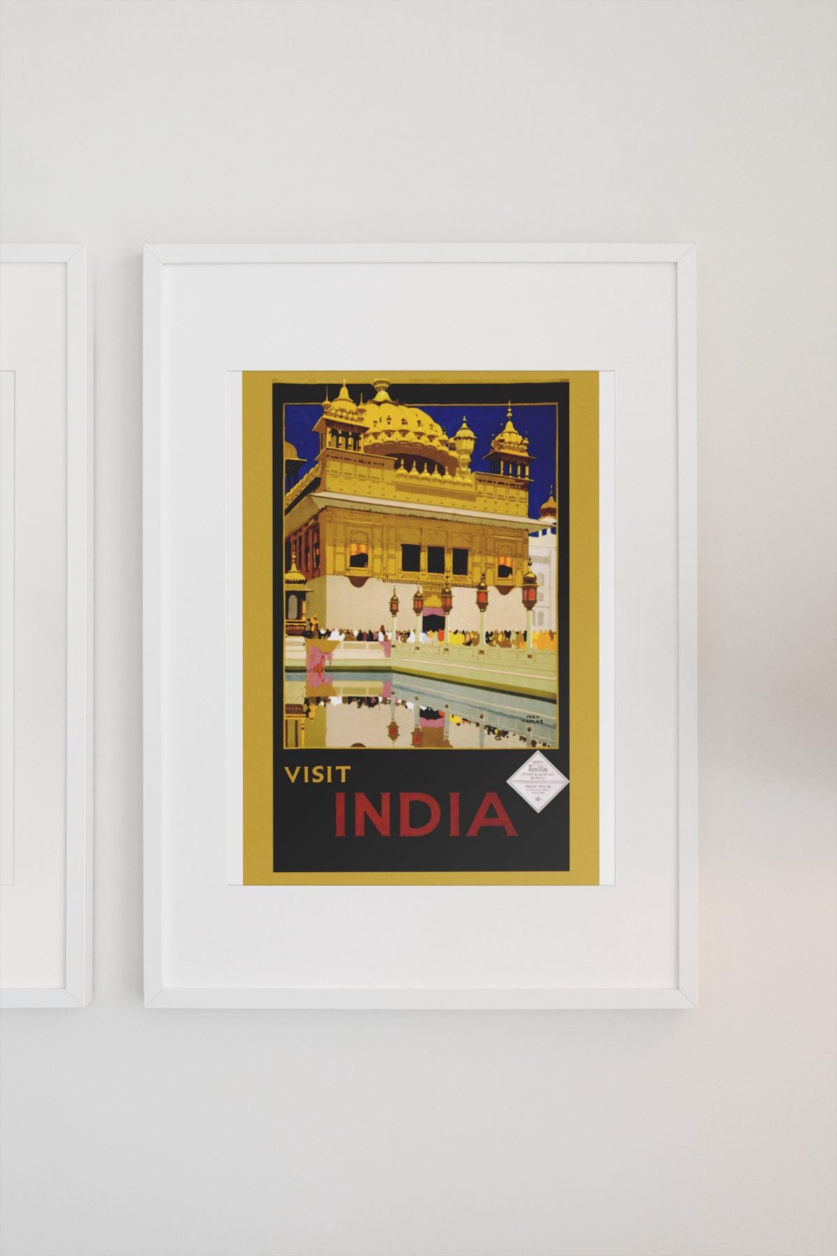 Visit India Golden Temple poster on a light wall