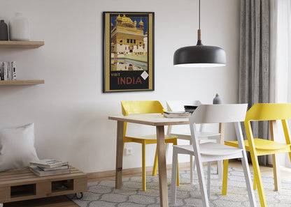 Visit India Golden Temple poster framed above a dining table