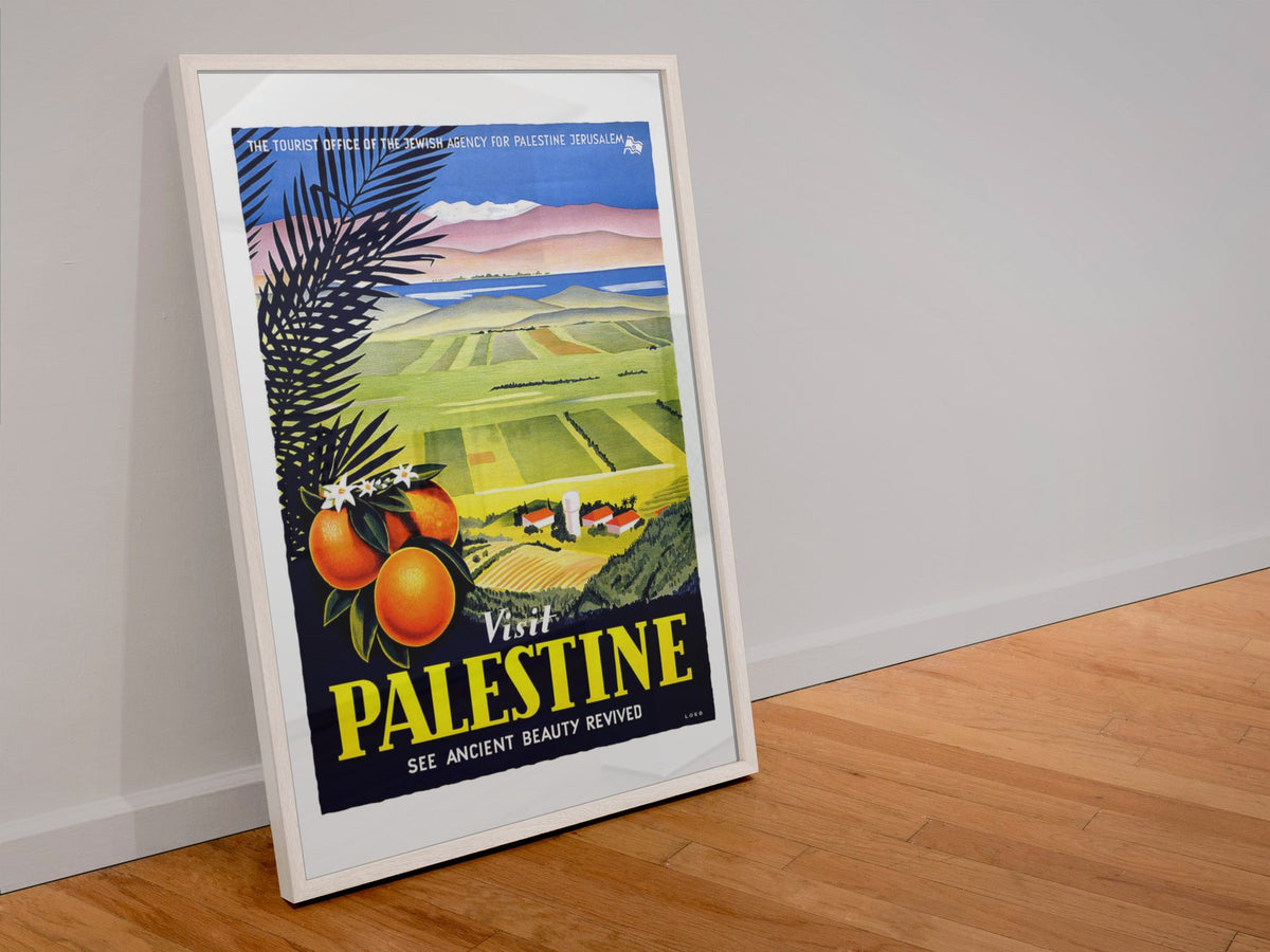 Visit Palestine Ancient Beauty Revived poster in a white frame leaning against a wall