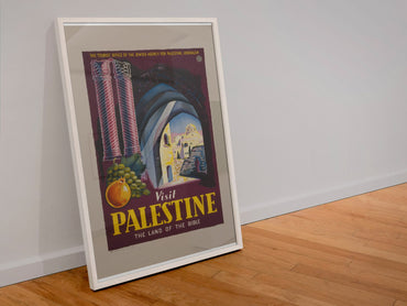 Visit Palestine Land of the Bible poster in a white frame leaning against a wall