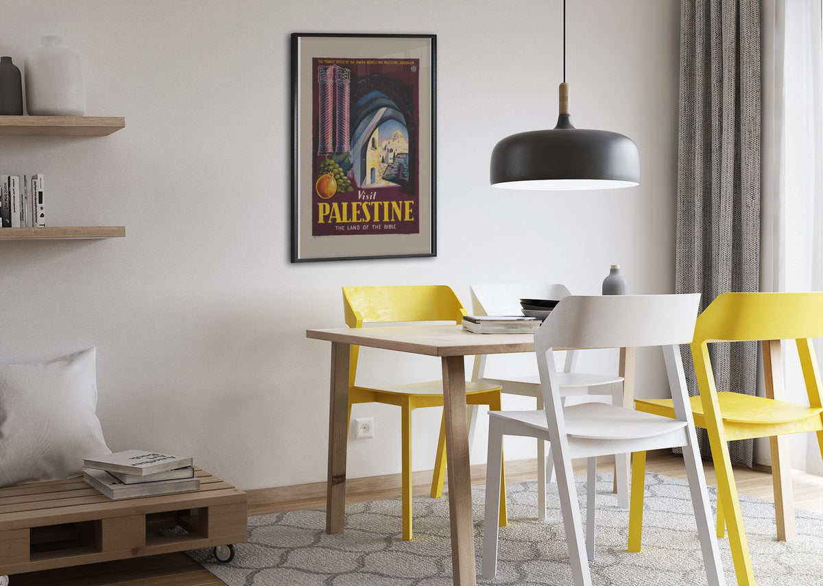 Visit Palestine Land of the Bible poster framed above a dining table