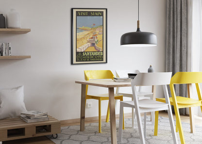 Visit Spain Santander poster framed above a dining table