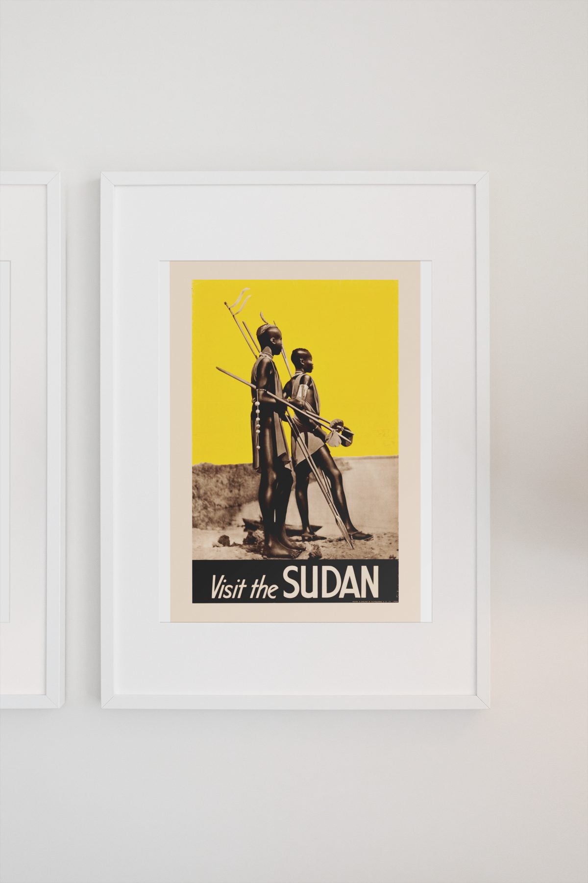 Visit the Sudan poster on a light wall