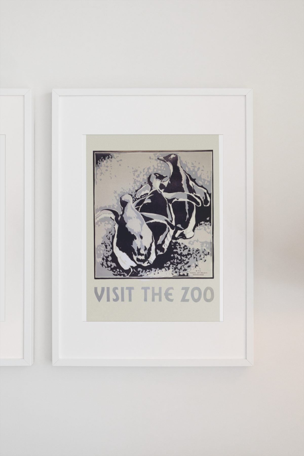 Visit the Zoo Penguins poster on a light wall