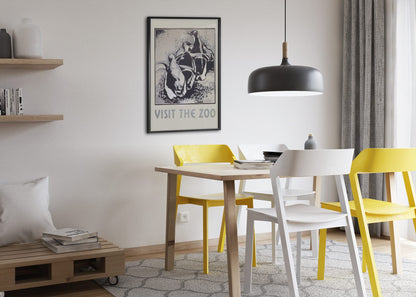 Visit the Zoo Penguins poster framed above a dining table