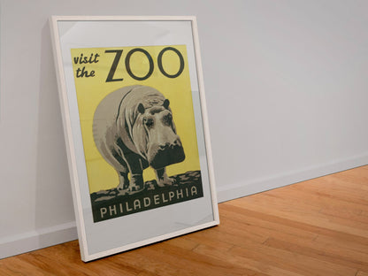 Visit the Zoo Philadelphia Hippo poster in a white frame leaning against a wall