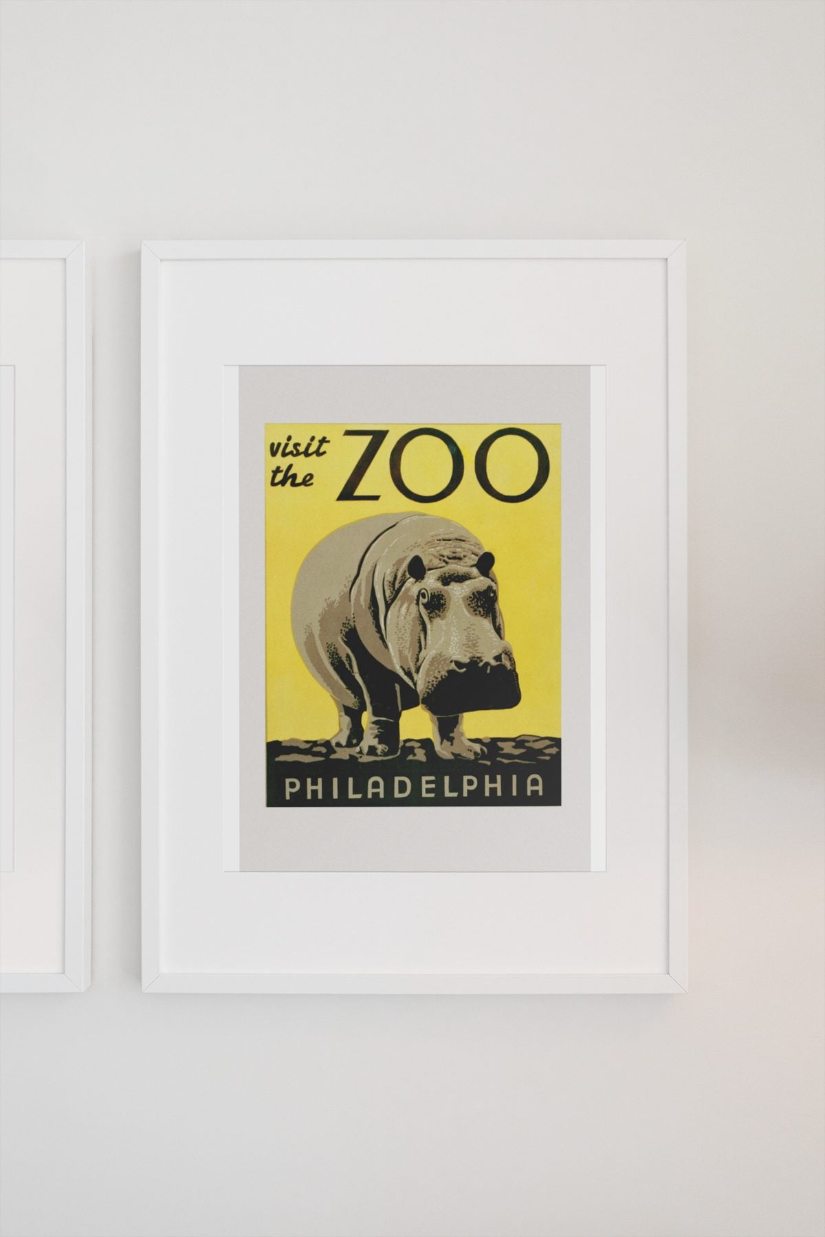 Visit the Zoo Philadelphia Hippo poster on a light wall