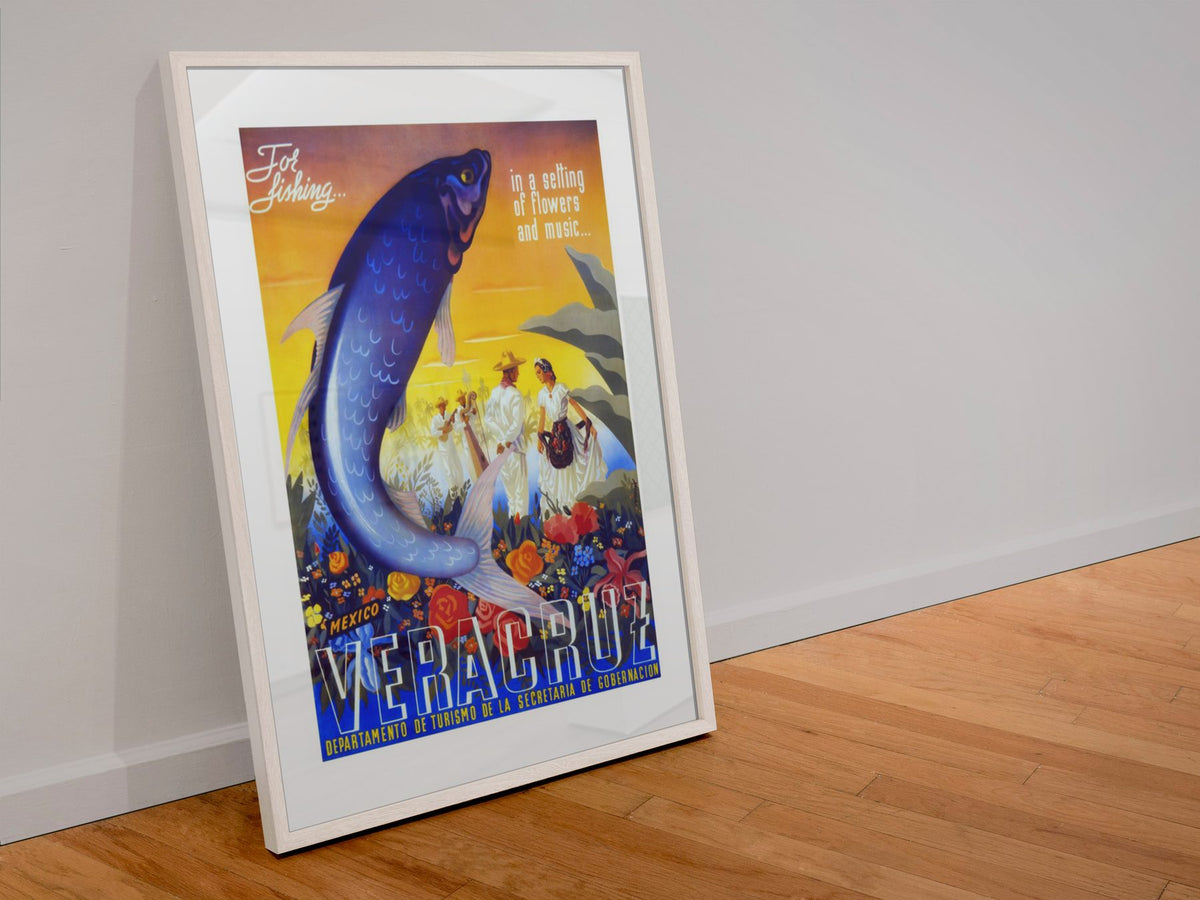 Visit Veracruz Fishing poster in a white frame leaning against a wall