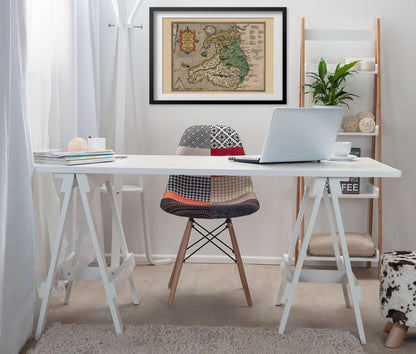 Wales & England 1580 Map print framed above a white desk in a home office