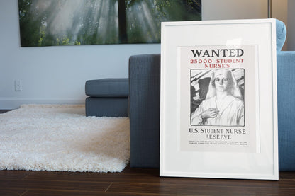 Wanted 25000 Student Nurses poster leaning beside a blue sofa