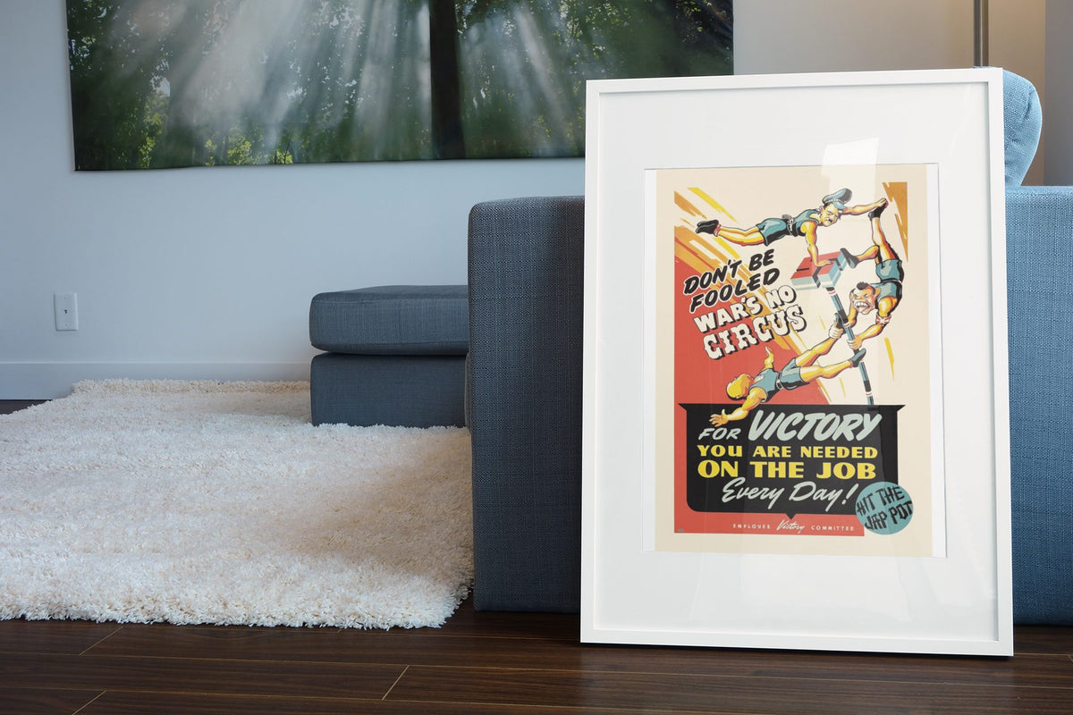 Wars No Circus poster leaning beside a blue sofa