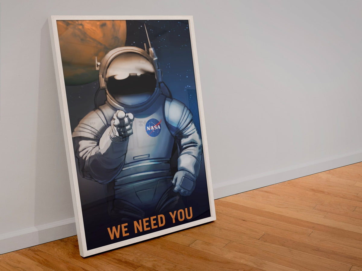 We Need You on Mars NASA recruitment poster in a white frame leaning against a wall