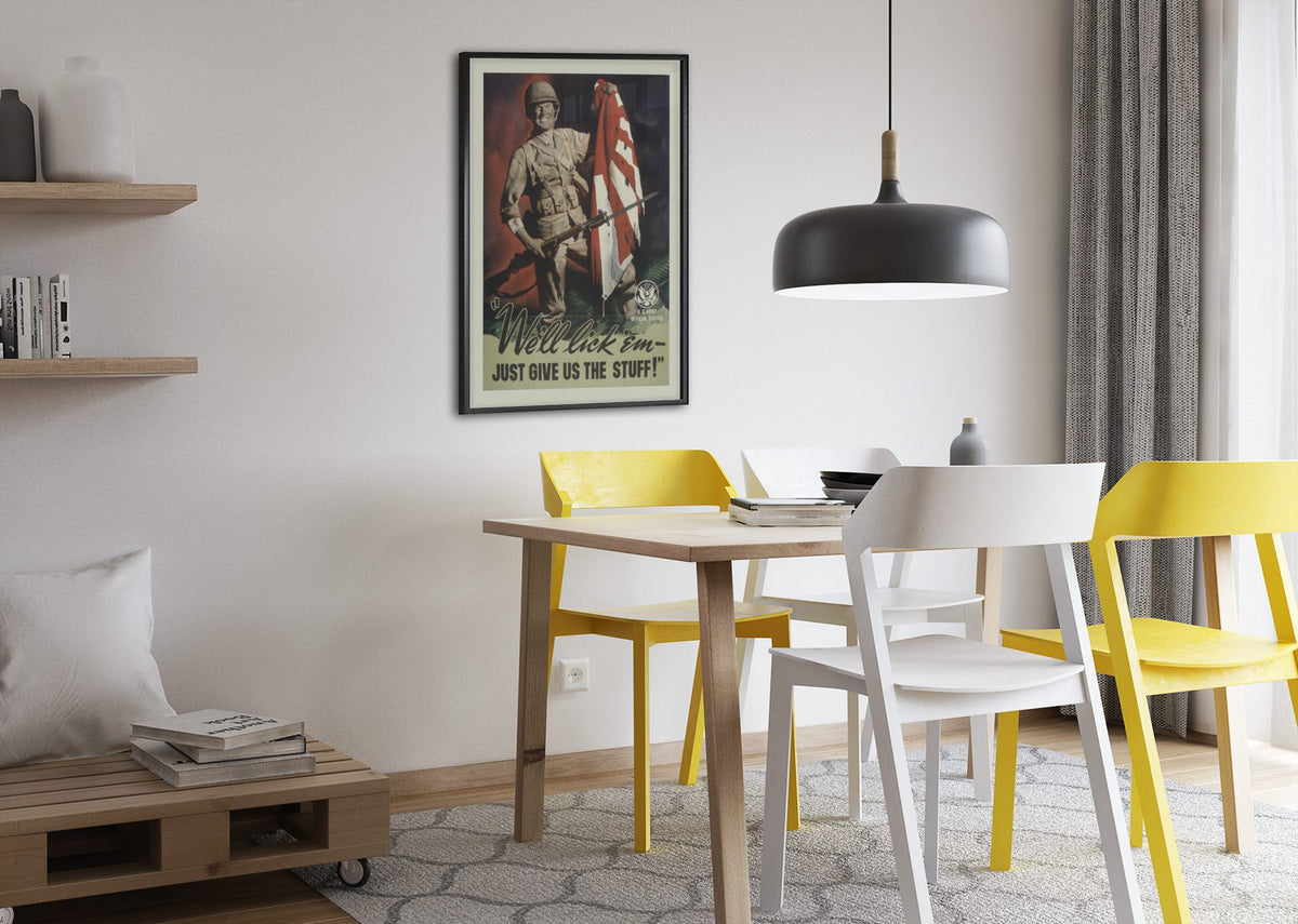 Well Lick Em Just Give Us the Stuff poster framed above a dining table