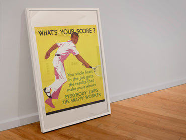 What’s Your Score poster in a white frame leaning against a wall