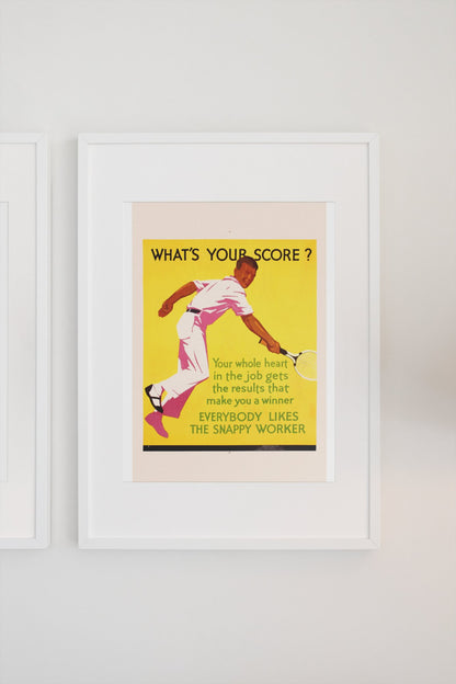 What’s Your Score poster in a white frame on a light wall