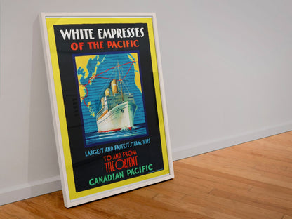 White Empresses of the Pacific poster in a white frame leaning against a wall