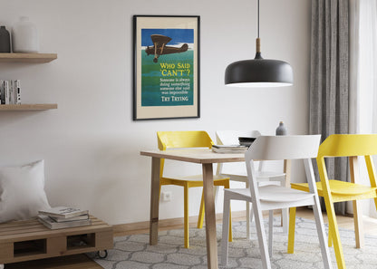 Who Said “Can’t” poster framed above a dining table