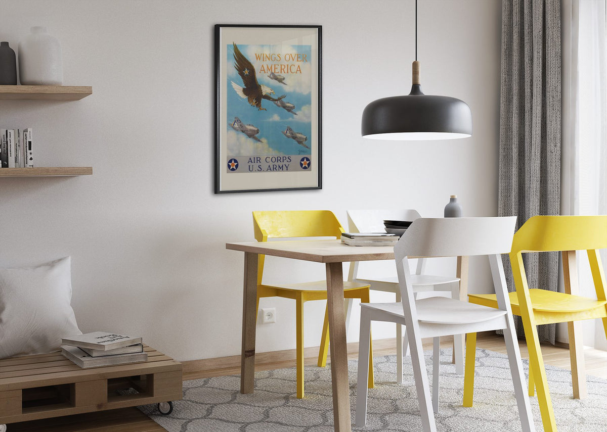 Wings Over America Air Corps US Army poster framed above a dining table
