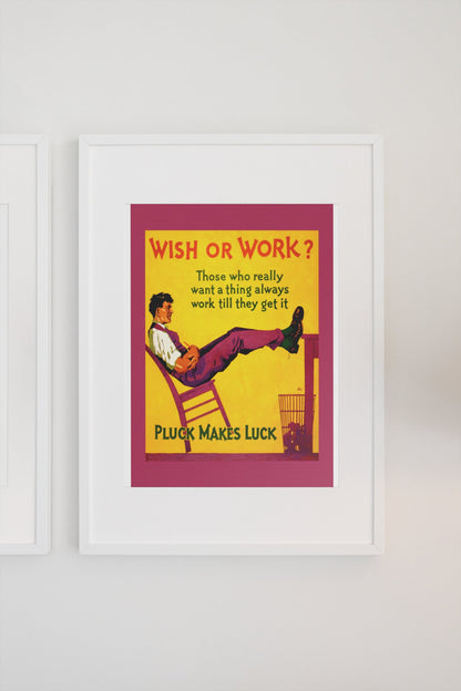 Wish or Work poster in a white frame on a light wall