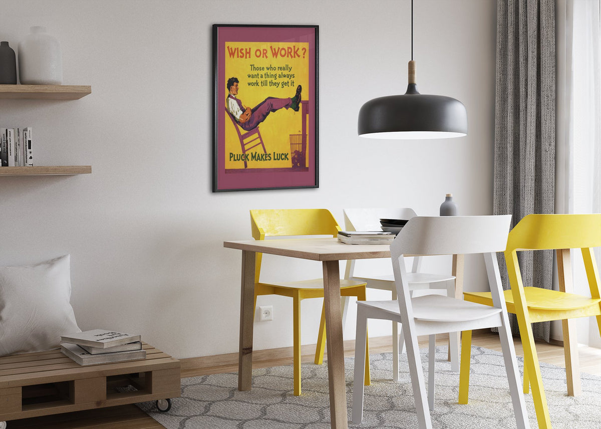 Wish or Work poster framed above a dining table