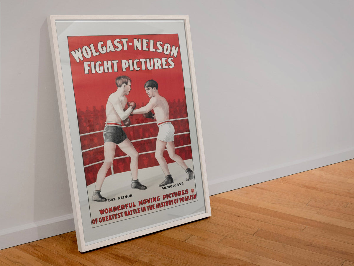 Wolgast Nelson Fight Pictures poster in a white frame leaning against a wall