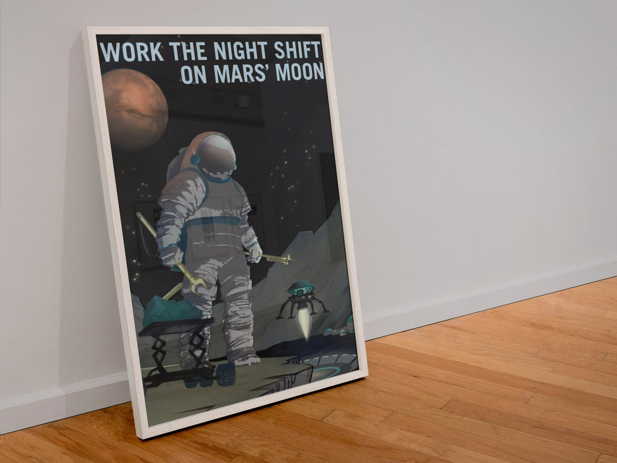 Work the Night Shift on Mars' Moon poster in a white frame leaning against a wall