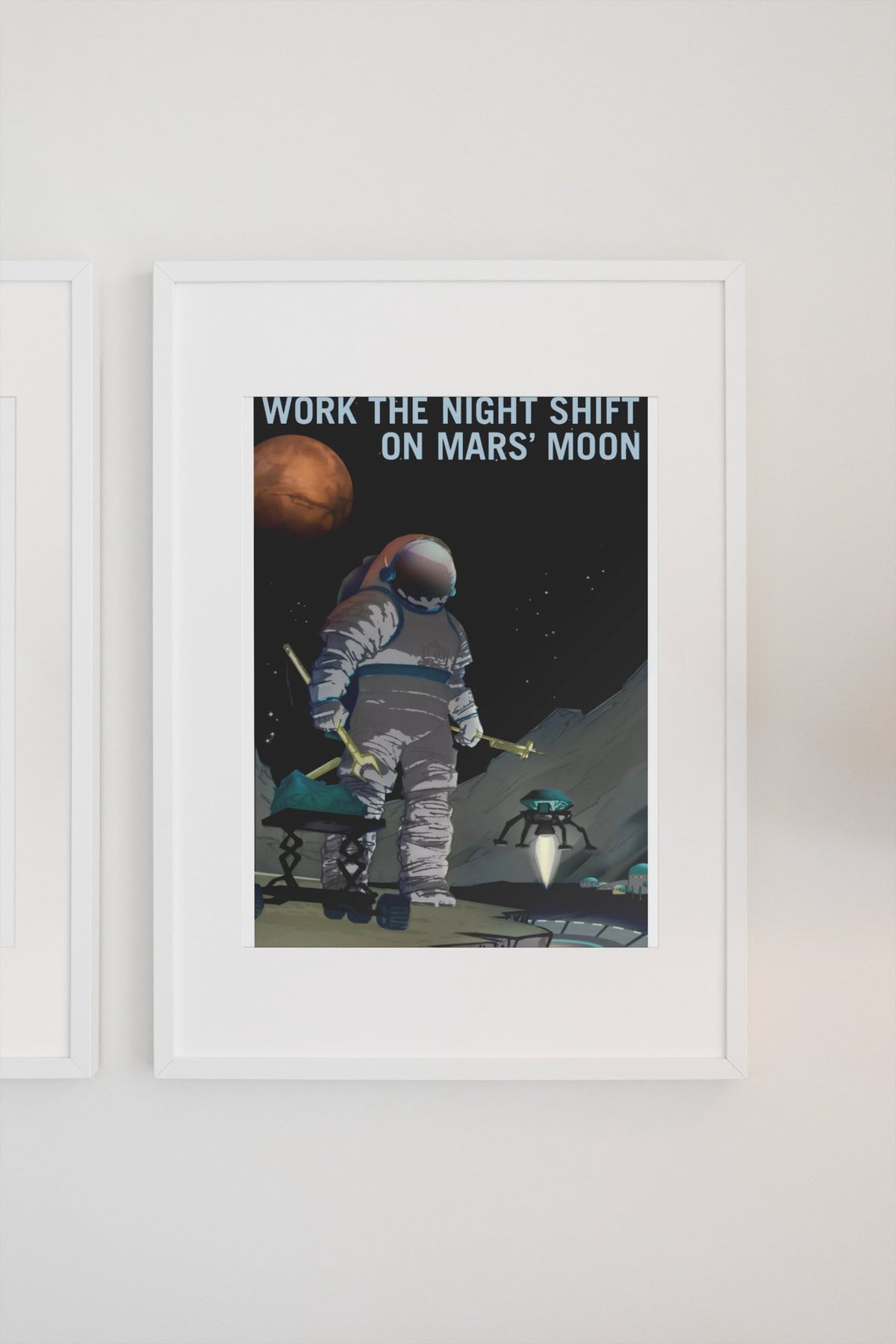 Work the Night Shift on Mars' Moon poster in a white frame on a light wall