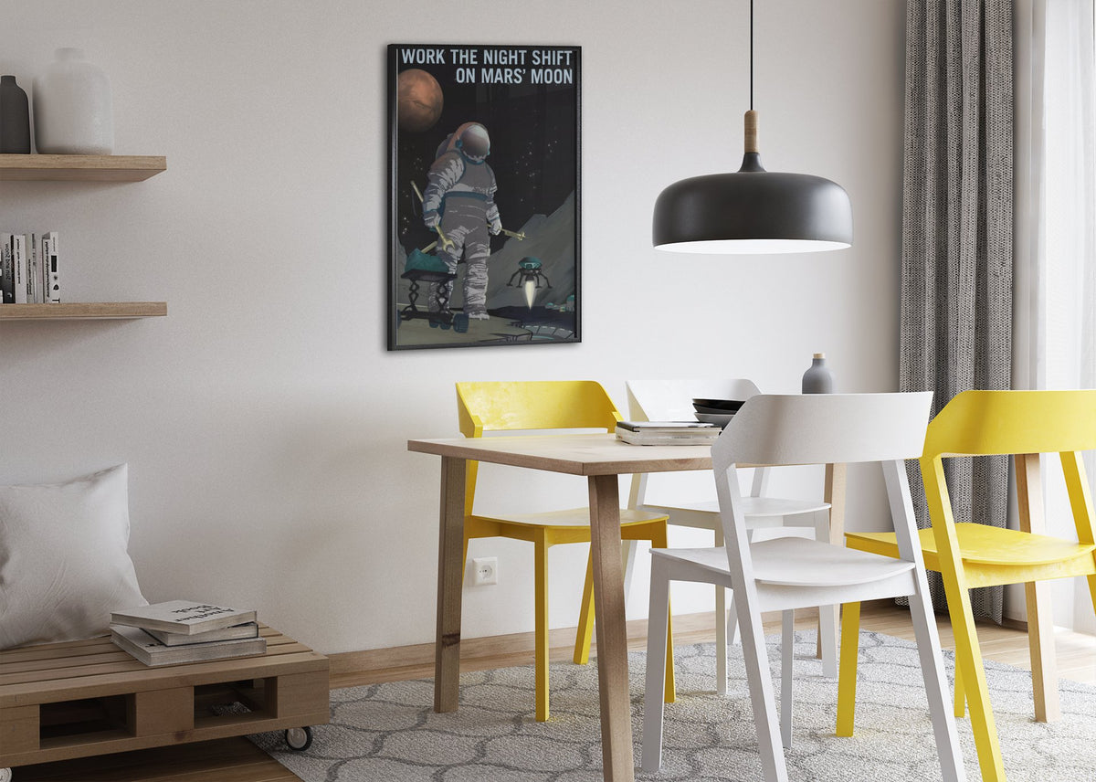 Work the Night Shift on Mars' Moon poster framed above a dining table