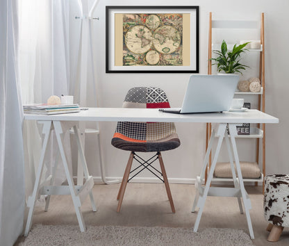 World Map 1689 framed above a white desk in a home office