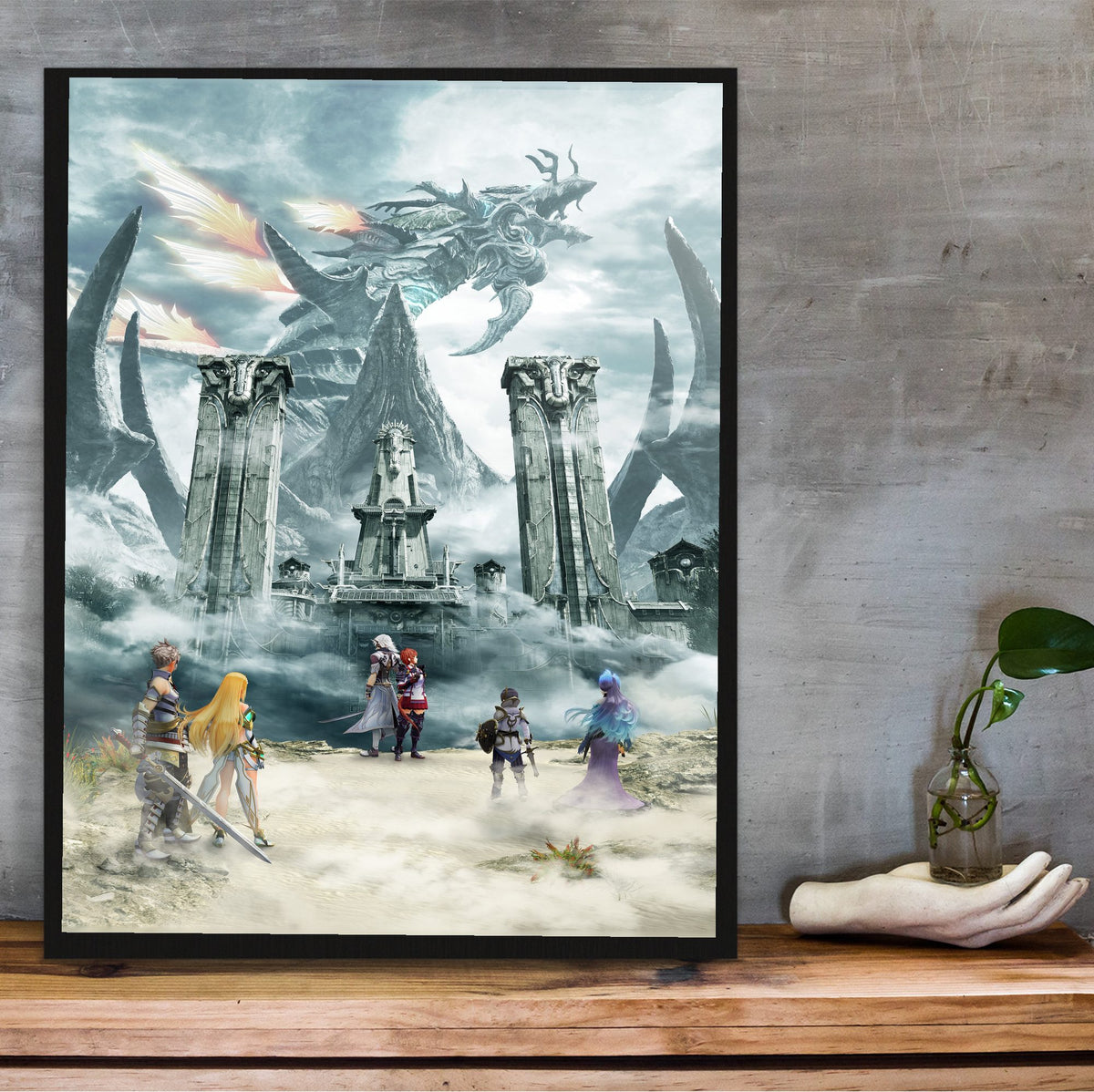 Xenoblade Chronicles 2: Torna – The Golden Country Key Art poster in a black frame on a wooden shelf against concrete