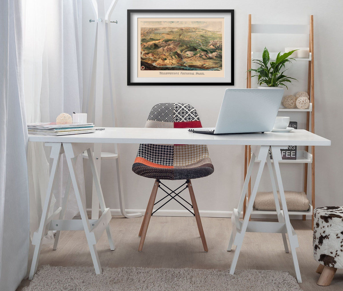 Yellowstone 1904 Map print framed above a white desk in a home office