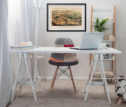 Yellowstone 1904 Map print framed above a white desk in a home office