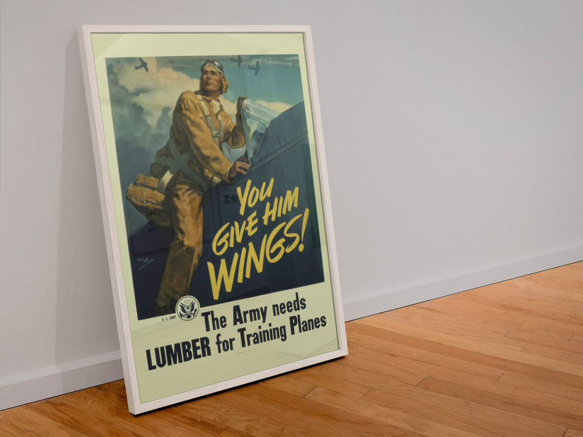 You Give Him Wings — Lumber for Training Planes poster in a white frame leaning against a wall