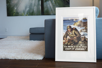 Your Metal Is on the Attack Keep It Coming poster leaning beside a blue sofa