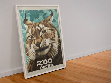 Zoo Berlin Lynx poster in a white frame leaning against a wall